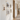 gallery wall with floating acrylic picture frames in hallway