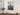 18 x 24 wall-mounted clear acrylic floating frame with gold standoffs displaying a black-and-white New York City photograph.