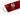 Red mirror acrylic sheet resting on a clear acrylic support, reflecting a freestanding white T&T logo